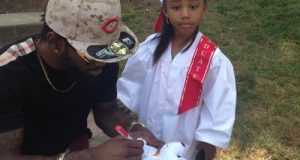 Saucekid with daughter at her graduation