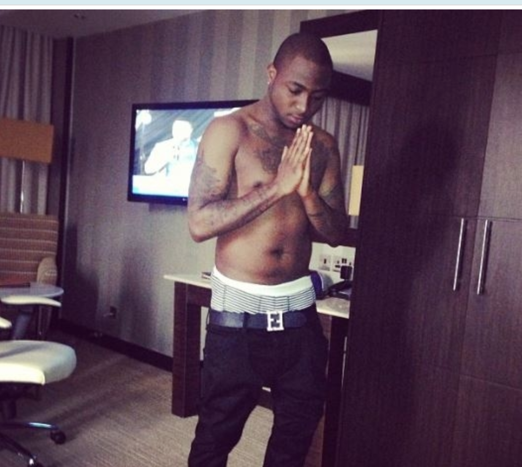 Davido shows off his tattoos