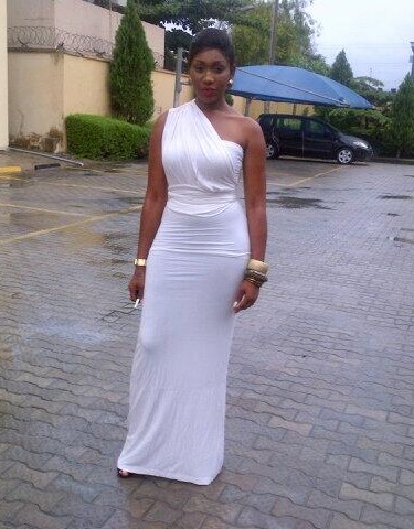 Ebube Nwagbo rocks a white outfit to Miss Global 2013