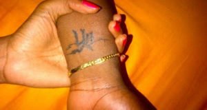 Iyanya's tattoo of Yvonne Nelson