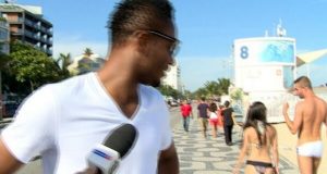Mikel Obi eyes bikini girl in Brazil while being interviewed
