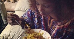 Genevieve shares a picture of herself eating Abacha