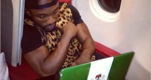 Iyanya shows off his customized Zinox laptop