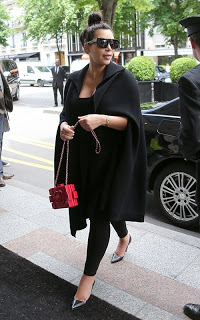 Kim Kardashian with Chanel Red Lego Clutch Bag