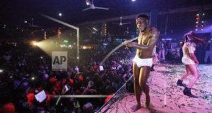 Burna Boy strips naked on stage