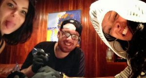 Rihanna covers her tribal hand tattoo with a more hideous tattoo