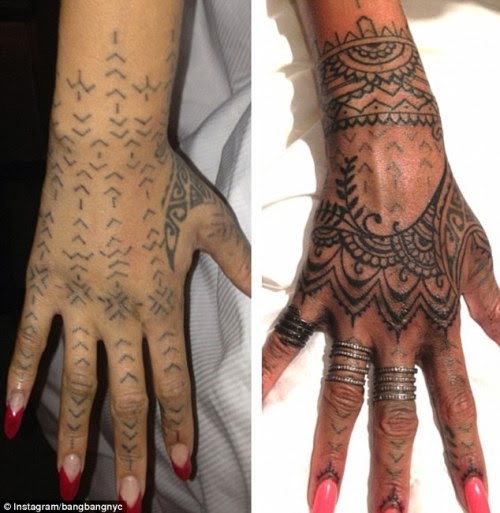 Rihanna covers her tribal hand tattoo with a more hideous tattoo