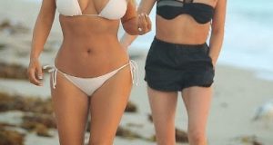 Kim K shows off sexy post-pregnancy body in white bikini
