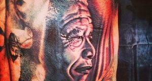 The Game tattoos Nelson Mandela's face on his body