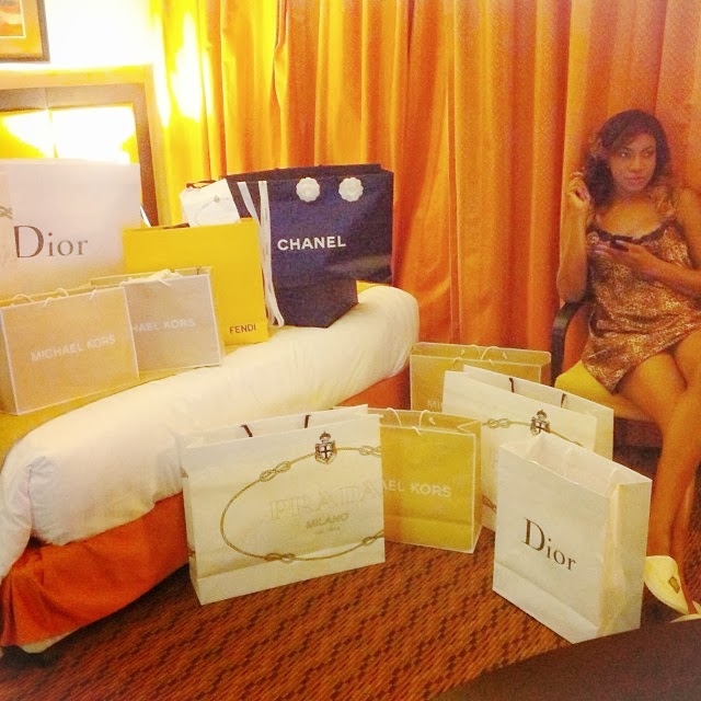 Chika Ike flaunts lots of designer shopping bags