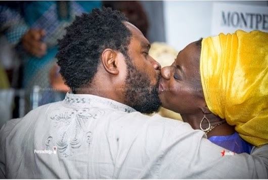 Cobhams Asuquo spotted kissing his wife