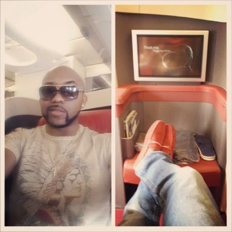 Banky W aboard an Arik Air flight bound for Lagos
