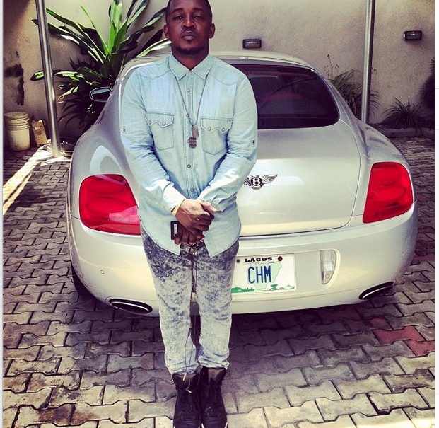 MI strikes a pose with his customized Bentley Continental GT