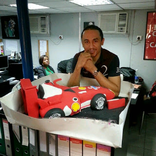 Freeze's Ferrari birthday cake and Rolex Wristwatch