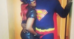 John Dumelo poses with Yvonne Nelson in Superman costume