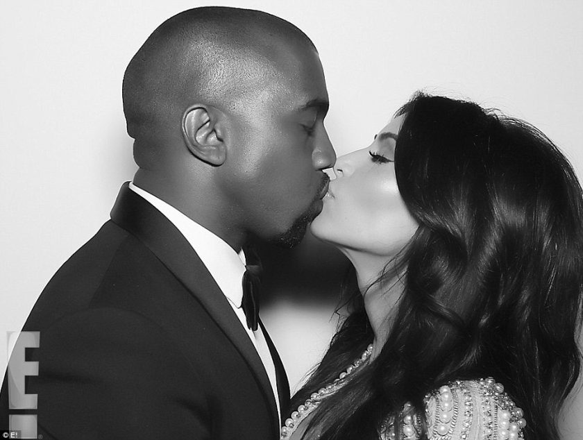 Kim Kardashian and Kanye West kiss
