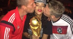 Rihanna with Lucas Podolski and Bastian Schweinsteiger