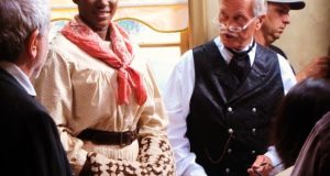 Stephanie Linus plays a Maid