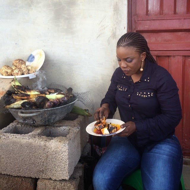 Empress Njama spotted eating roasted yam
