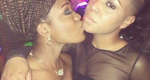 Moet Abebe Kissing A Lady