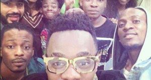 Patoranking takes a selfie with Omotola Jalade and her kids