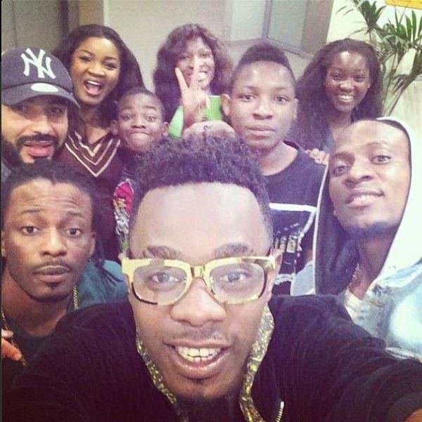 Patoranking takes a selfie with Omotola Jalade and her kids