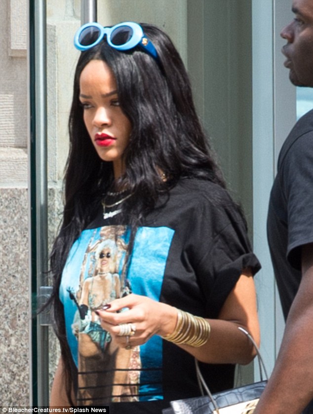 Rihanna rocks a shirt of herself NaijaVibe
