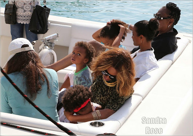 Blue Ivy vomits into Beyonce's hand as she gets seasick
