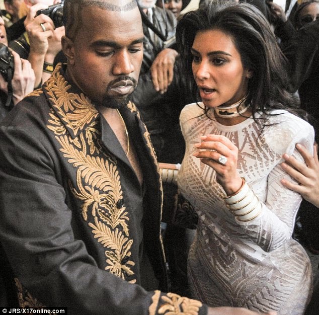 Kim Kardashian and Kanye West at Paris Fashion Week 2014