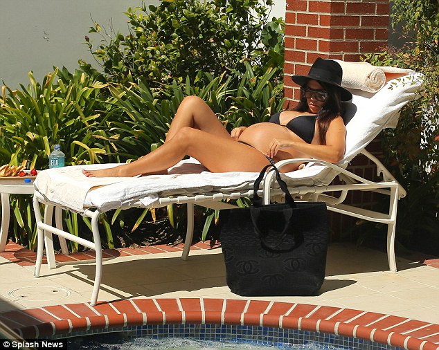 Kourtney Kardashian flaunts baby bump in skimpy bikini NaijaVibe
