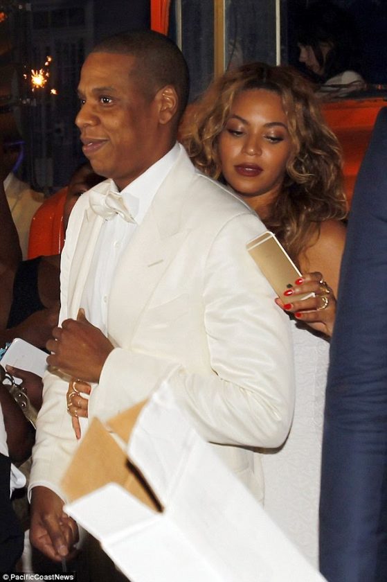 Jay Z and Beyonce loved up at Solange's wedding