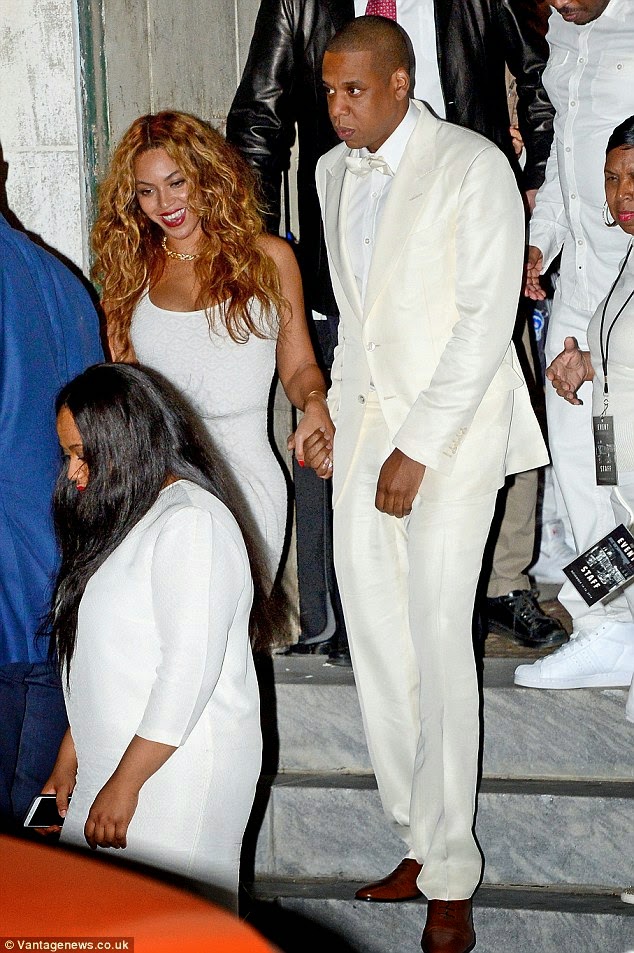 Jay Z and Beyonce loved up at Solange's wedding