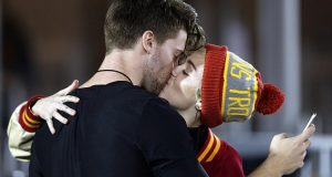 Miley Cyrus and Patrick Schwarzenegger kiss in public