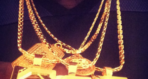 "I got ur rent on my neck" Burna Boy flaunts gold chain