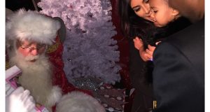 North West Scared as Kim & Kanye take her to see Santa