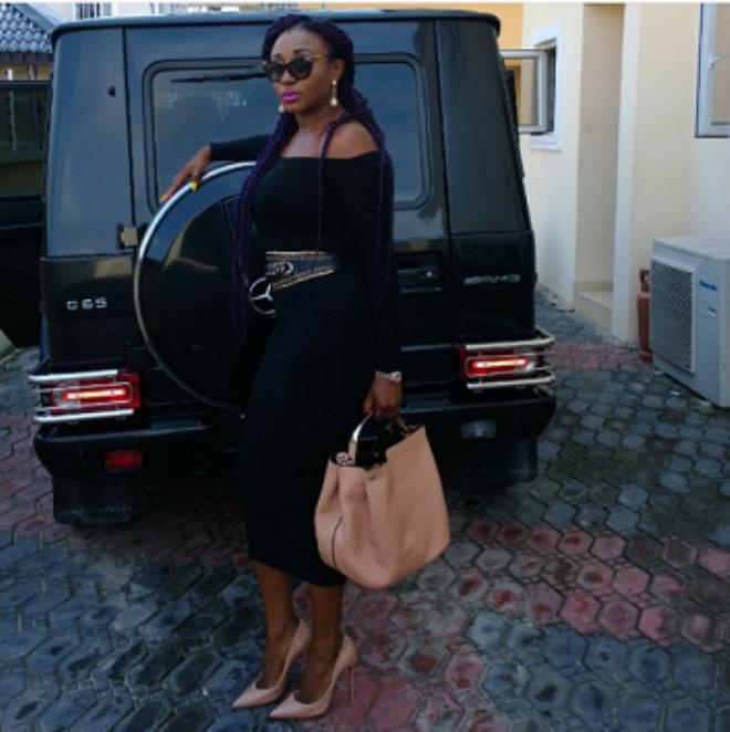 Ini Edo poses with her N40m G-Wagon SUV
