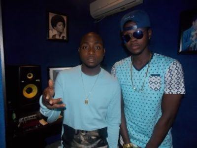 Kiss Daniel and Davido doing the Shoki dance