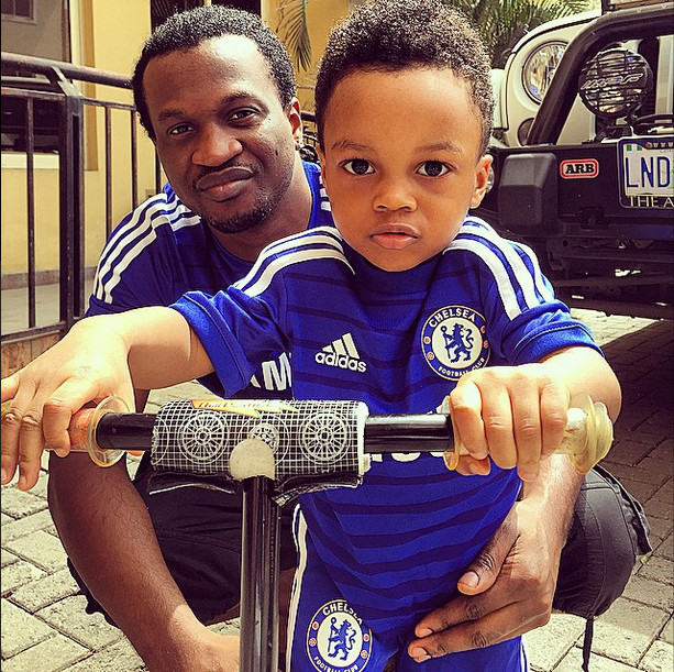 Paul Okoye and son in Chelsea jersey