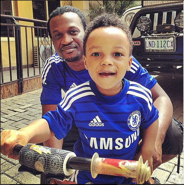 Paul Okoye and son in matching jersey