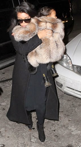 Kim K & North West in fur dress