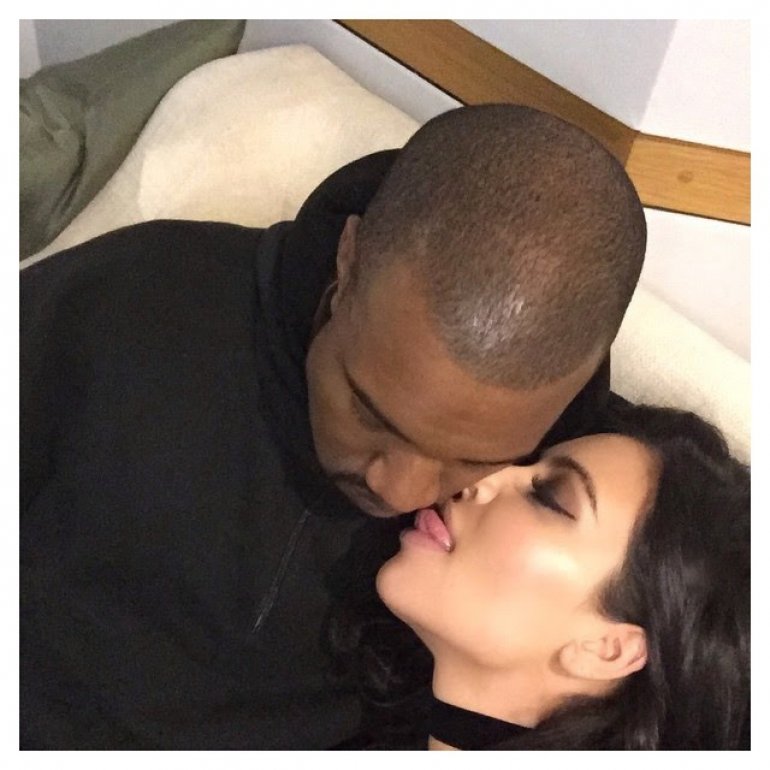 Kim Kardashian licks Kanye's face