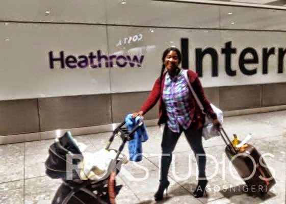 Mercy Johnson spotted with her son at Heathrow Airport 2015 NaijaVibe