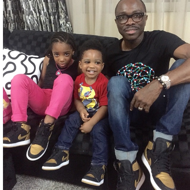 Julius Agwu rocks matching footwear with his kid
