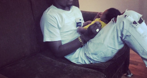 Olamide shows off one-month old son