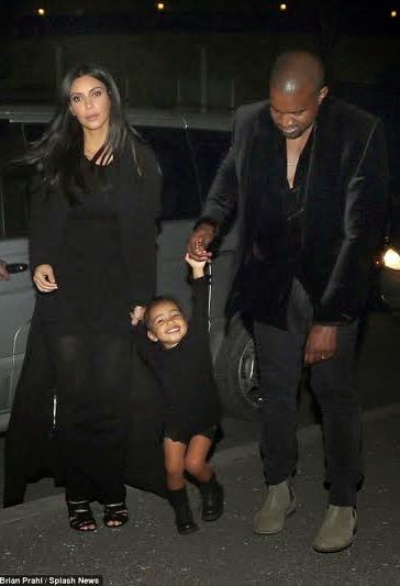 North West giggles with Kim and Kanye West