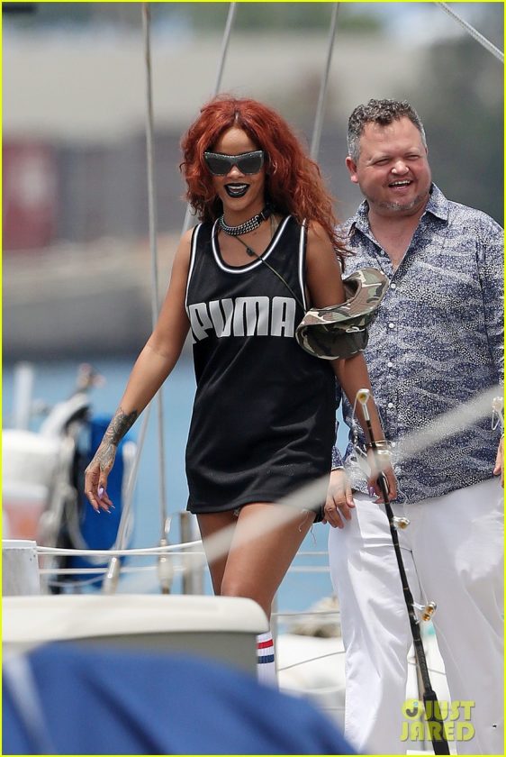 Rihanna red hair for boat ride in hawaii