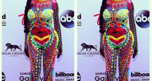 Dencia's attire as she attends the 2015 Billboard Music Awards