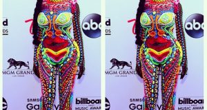 Dencia's attire as she attends the 2015 Billboard Music Awards
