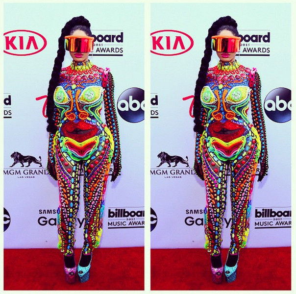 Dencia's attire as she attends the 2015 Billboard Music Awards