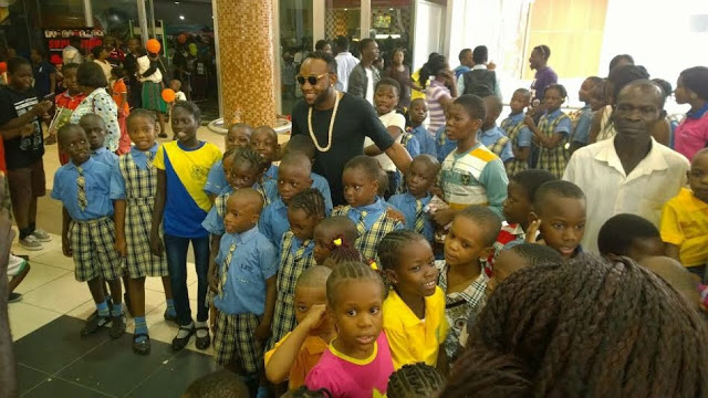 Kcee out with kids